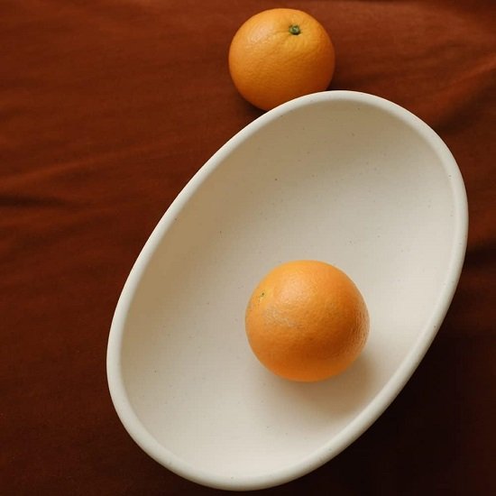 Three-Legs Ceramic Fruit Bowl for Kitchen Counter, Decorative Bowl for Table Décor, 10-inch Oval Large Bowls for Breads, Matte Crème